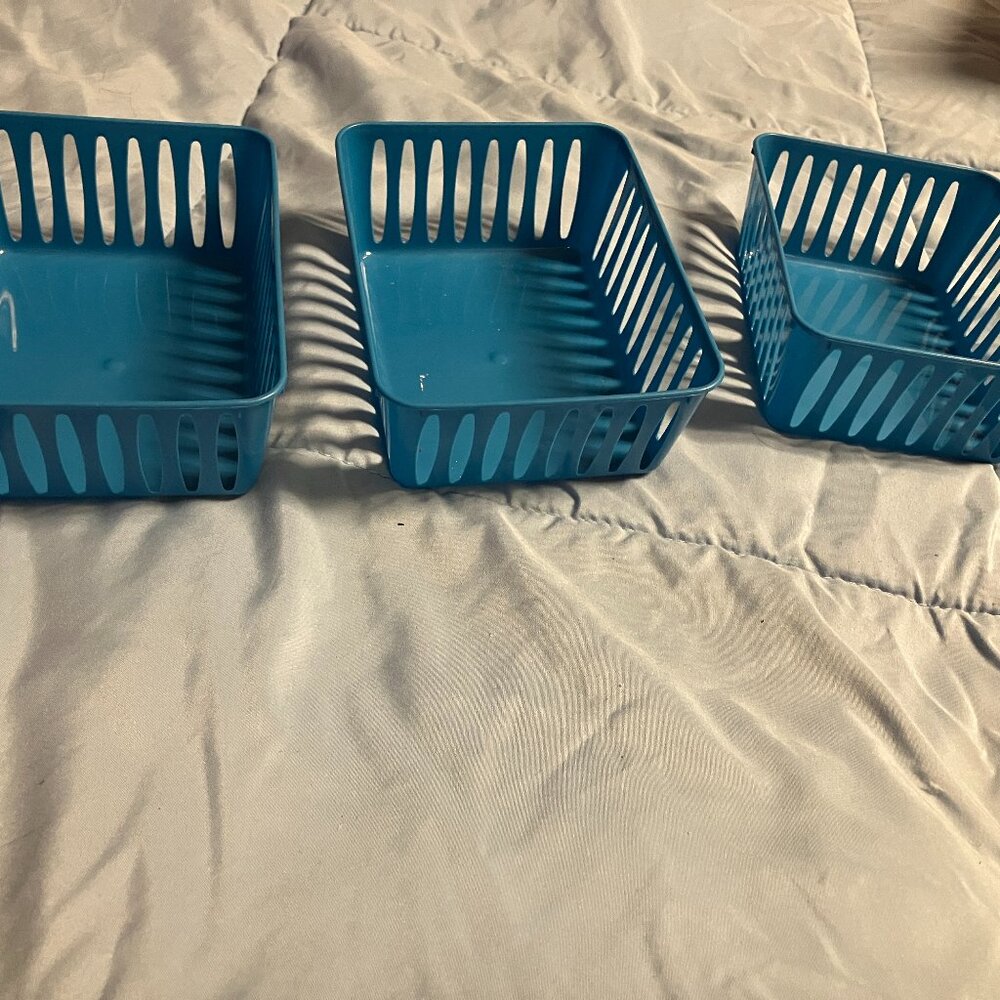 Three Blue Storage Containers